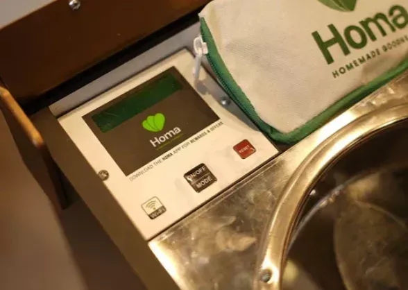 Homa control panel with touch display, showing app pairing and machine mode options