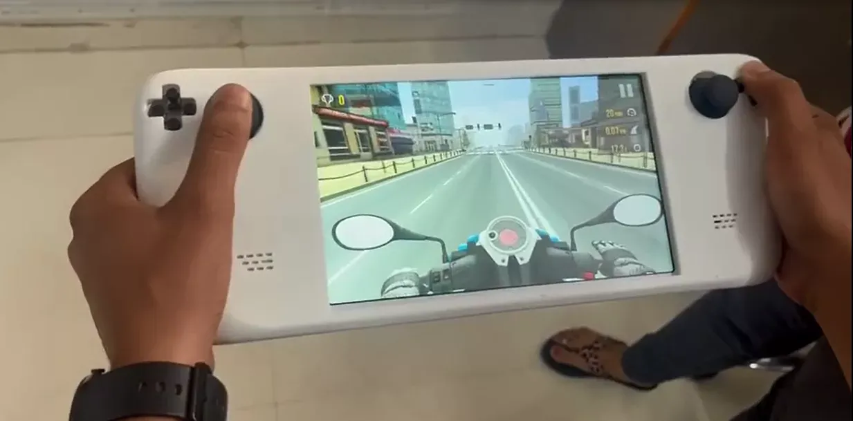 The finished handheld console in use, running the client’s earning-based gaming platform