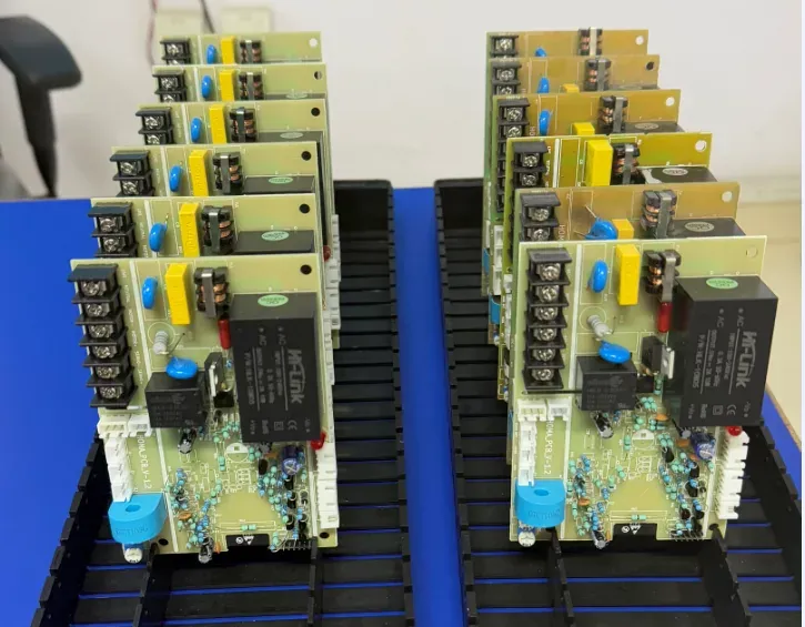 Batch of assembled Homa control PCBs ready for production