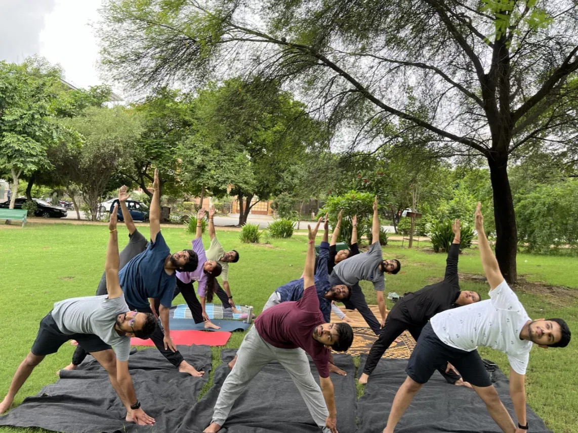 Team yoga session outdoors