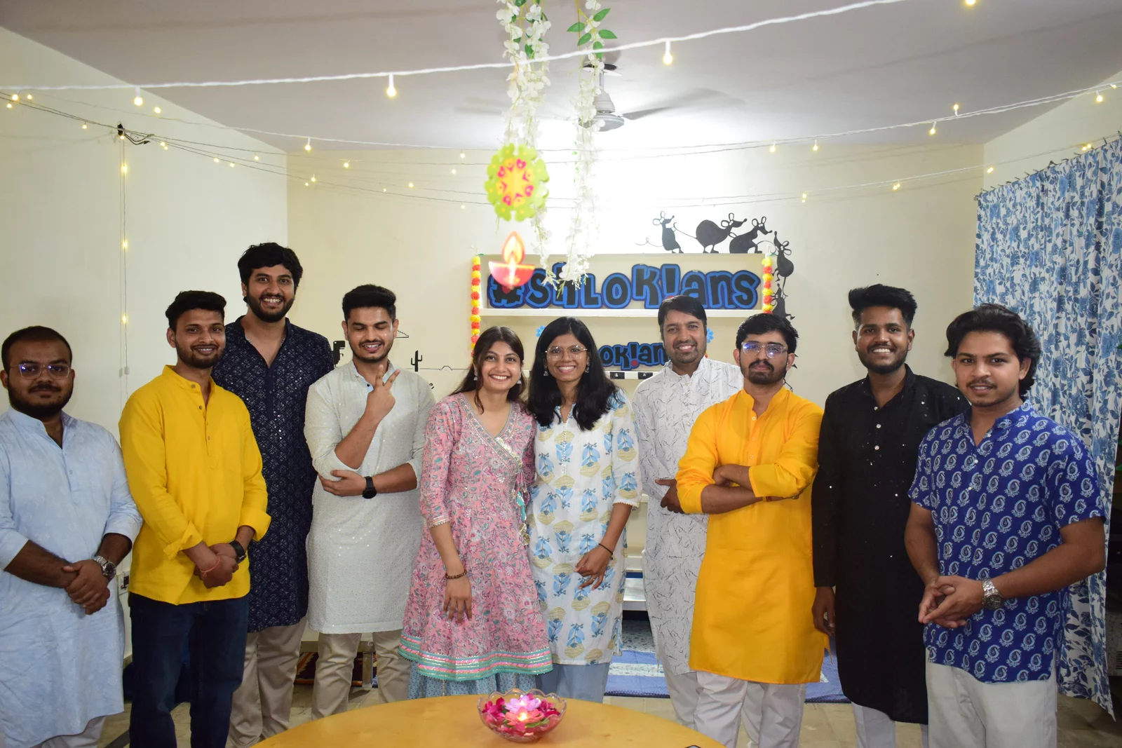 The Techshlok team celebrating a festival together at the office, dressed in traditional attire